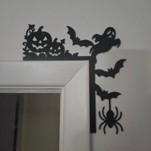 Ghost, pumpkins, bats with a spider door corner art