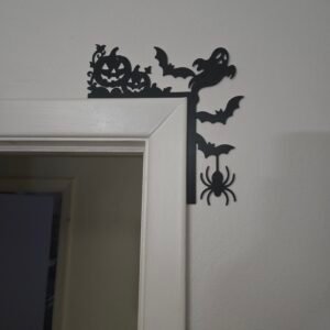 Halloween corner door art with pumpkins, bats, ghost, and a spider
